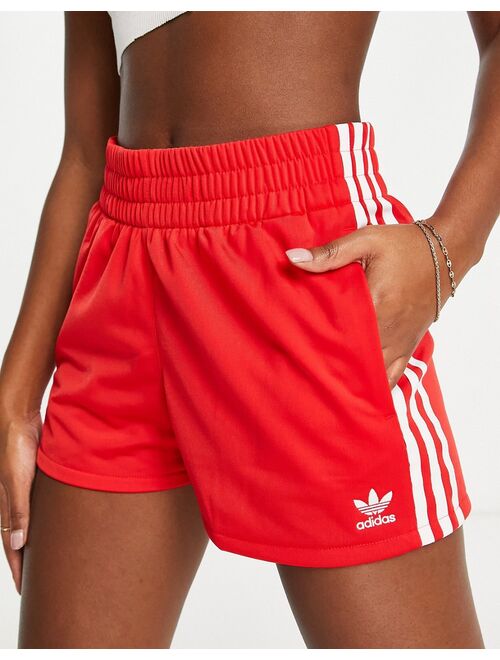 adidas Originals adicolor three stripe shorts in red