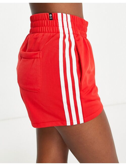 adidas Originals adicolor three stripe shorts in red