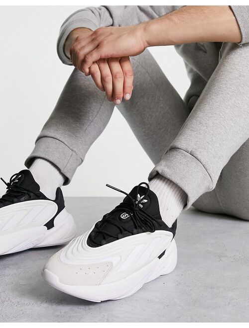 adidas Originals Ozelia sneakers in white and black