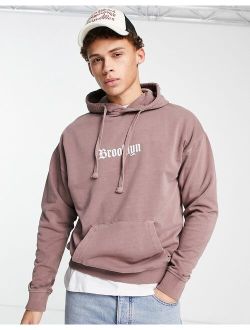 hoodie with Brooklyn print in washed rust