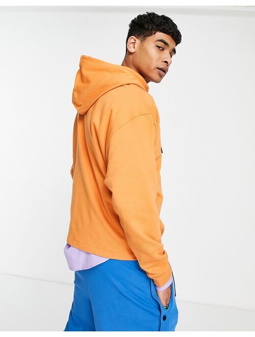 ASOS DESIGN oversized hoodie with toggle details in orange