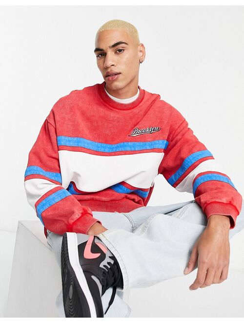 ASOS DESIGN oversized sweatshirt in red and white blocking with print and wash