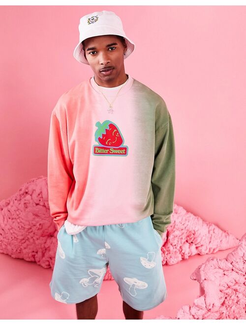 ASOS DESIGN oversized sweatshirt in ombre tie dye with strawberry print