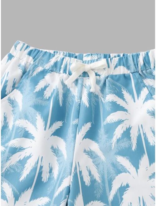 SHEIN Boys Tropical Print Slant Pocket Shorts