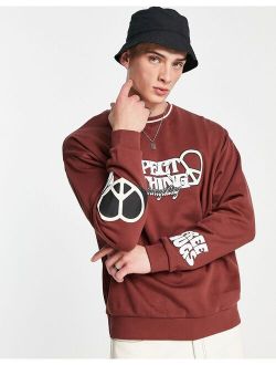 oversized sweatshirt in brown with text prints
