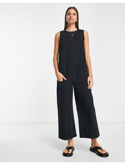 ASOS DESIGN twill minimal sleeveless jumpsuit with pockets in black