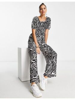 shirred abstract zebra print jumpsuit in black