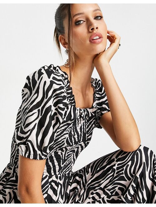 River Island shirred abstract zebra print jumpsuit in black