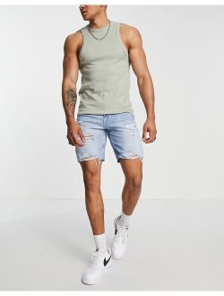 straight fit denim shorts with rips in mid blue