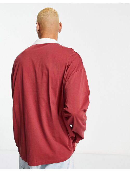 ASOS DESIGN oversized long sleeve polo t-shirt in burgundy with Michigan print