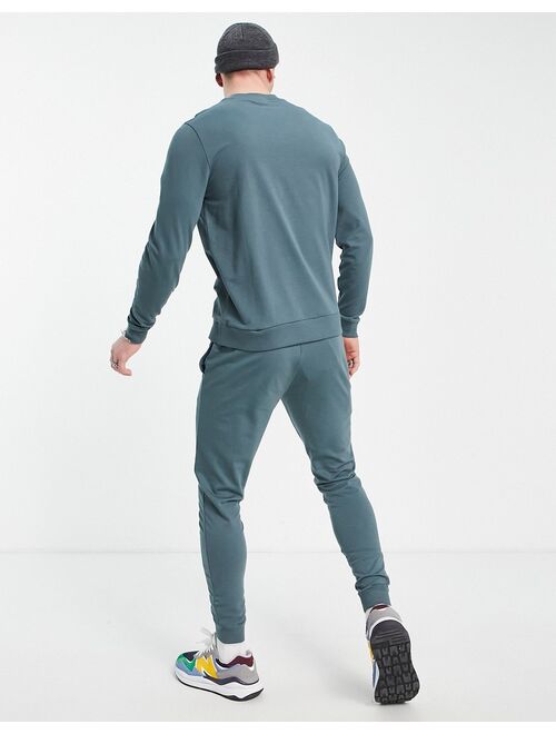 ASOS DESIGN lightweight tracksuit in dark gray with logo text print
