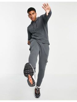 tracksuit with hoodie & skinny cargo sweatpants in washed black