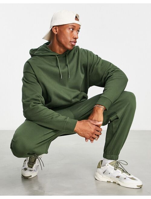 ASOS DESIGN tracksuit with oversized hoodie and oversized sweatpants in khaki