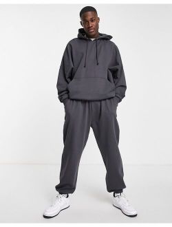 super oversized tracksuit with hoodie & sweatpants in washed black