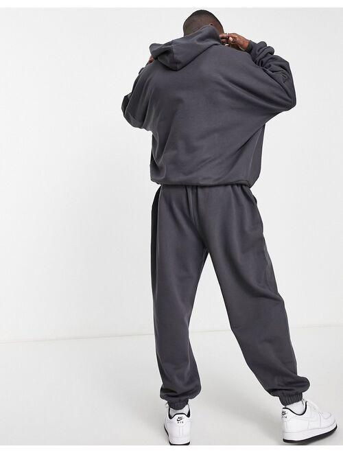 ASOS DESIGN super oversized tracksuit with hoodie & sweatpants in washed black
