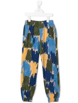 all-over graphic-print trousers