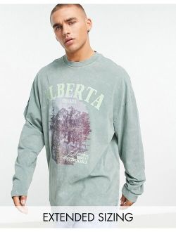 oversized long sleeve T-shirt in washed green with Alberta front & back print