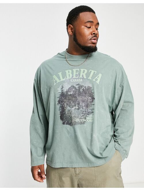ASOS DESIGN oversized long sleeve T-shirt in washed green with Alberta front & back print