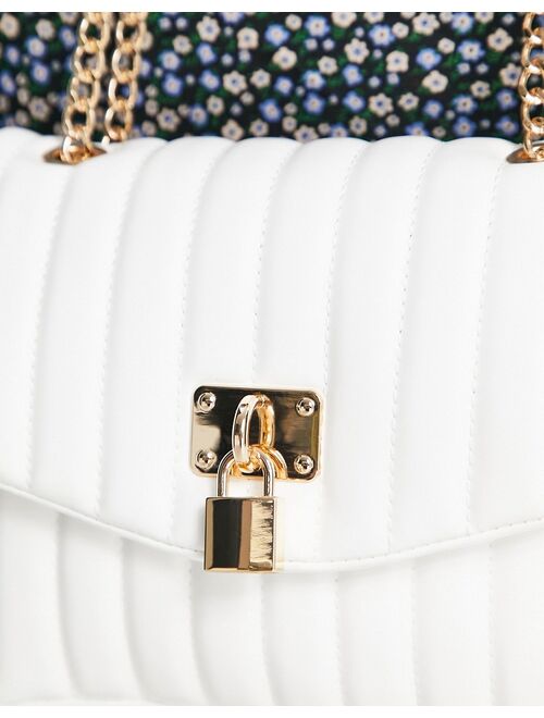 ASOS DESIGN adjustable quilted shoulder bag with padlock in white