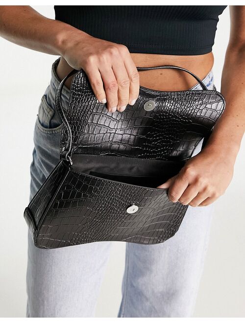 ASOS DESIGN curved base shoulder bag with feature hardware in black croc