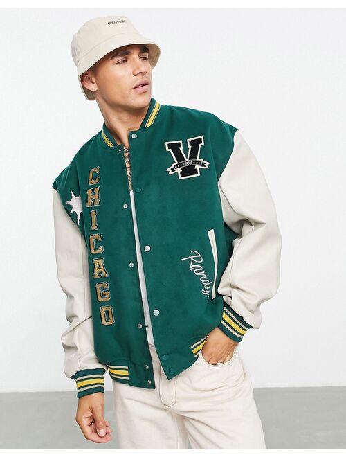 ASOS DESIGN oversized varsity bomber jacket with faux leather sleeves in green