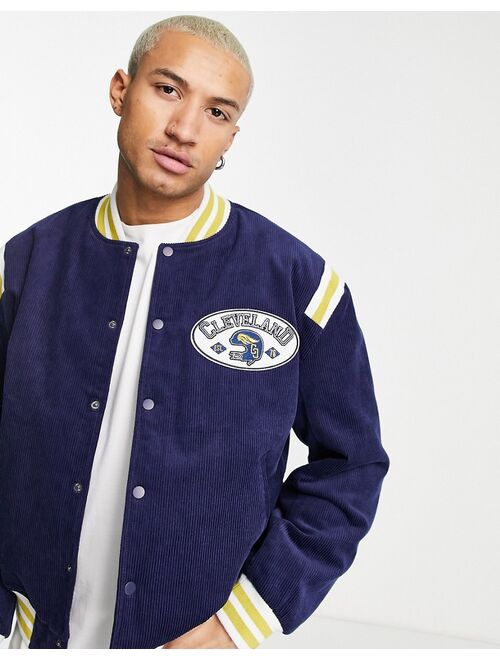 ASOS DESIGN cord varsity bomber jacket in navy with contrast trims