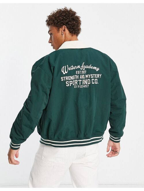 ASOS DESIGN varsity bomber jacket with contrast cord collar in green