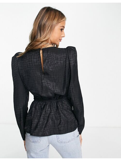 River Island jacquard twist front top with puff shoulder in black