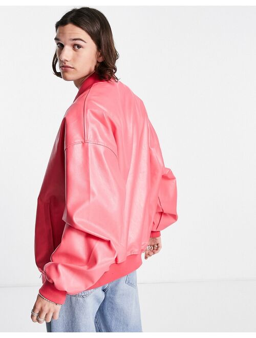 ASOS DESIGN extreme oversized faux leather bomber jacket in pink