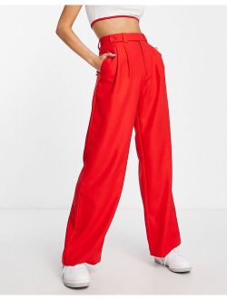 tailored dad pants with button detail in red