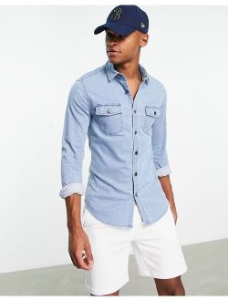 skinny denim shirt with rips in light blue