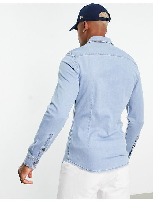 ASOS DESIGN skinny denim shirt with rips in light blue