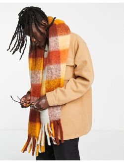 blanket scarf in orange and brown check