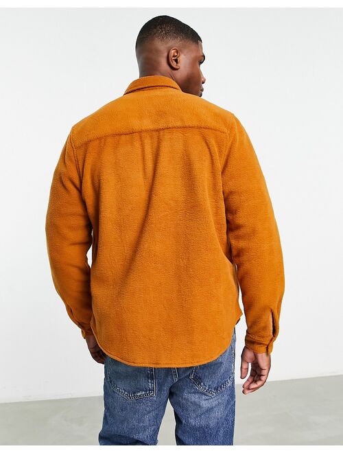 ASOS DESIGN overshirt in fleece with double pockets in brown