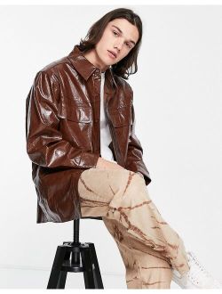 faux leather shacket in embossed brown snake print