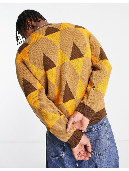 ASOS DESIGN knitted geo print sweater in earthy tones