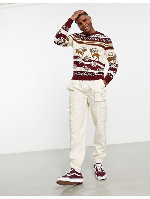 ASOS DESIGN knitted christmas sweater with fairisle stag in red