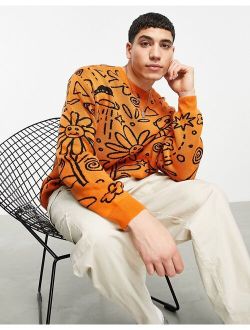 knit oversized sweater with doodle design in orange