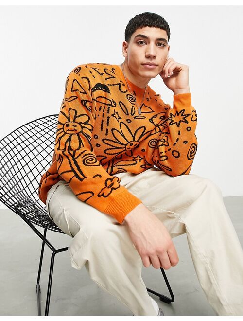 ASOS DESIGN knit oversized sweater with doodle design in orange