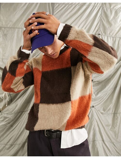 ASOS DESIGN fluffy knit checkerboard sweater in orange & gray
