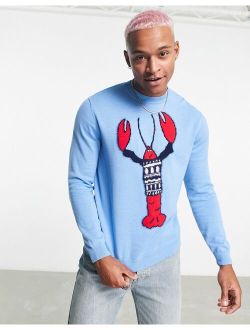 knitted christmas sweater with festive lobster in blue