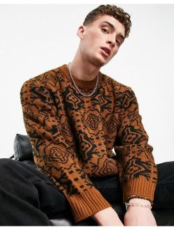 blown up tile print graphic sweater in rust