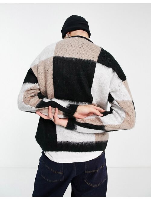 ASOS DESIGN fluffy knit checkerboard sweater in black white and beige