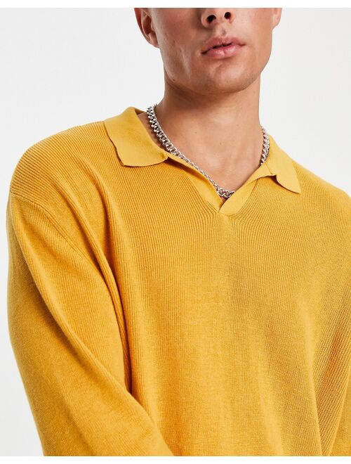 ASOS DESIGN lightweight oversized rib sweater with notch neck in mustard
