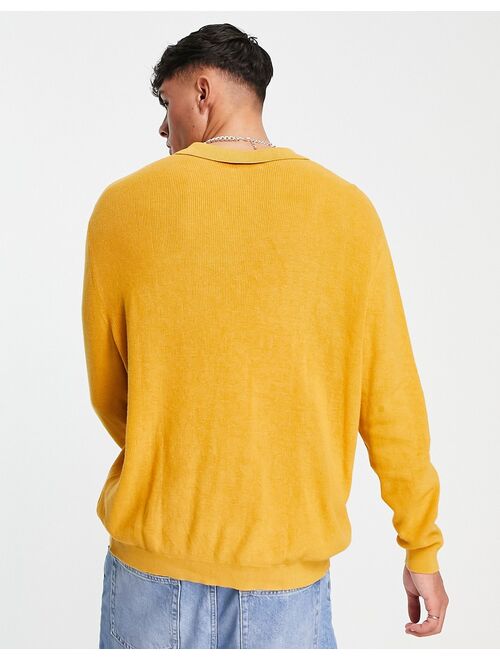 ASOS DESIGN lightweight oversized rib sweater with notch neck in mustard