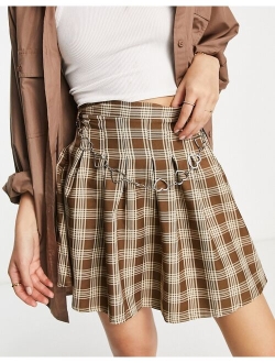 Daisy Street pleated 90s mini skirt in grunge plaid with heart chain belt
