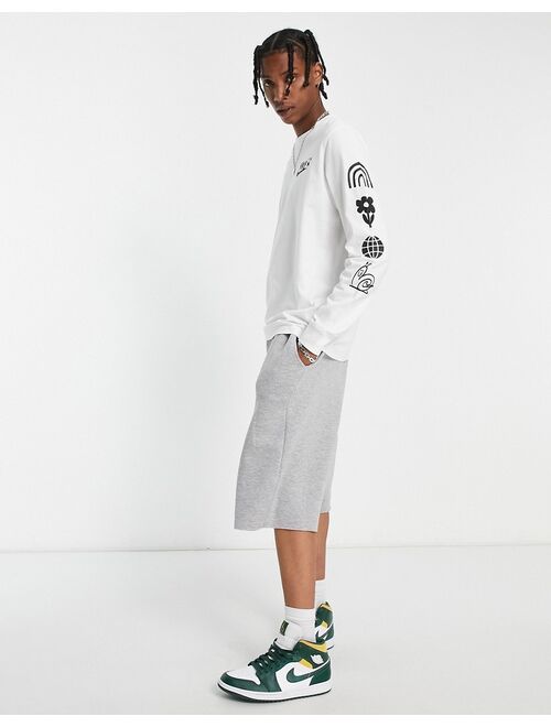 Nike long sleeve graphic t-shirt in white with arm print