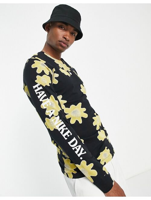 Nike Statement floral print long sleeve t-shirt in black