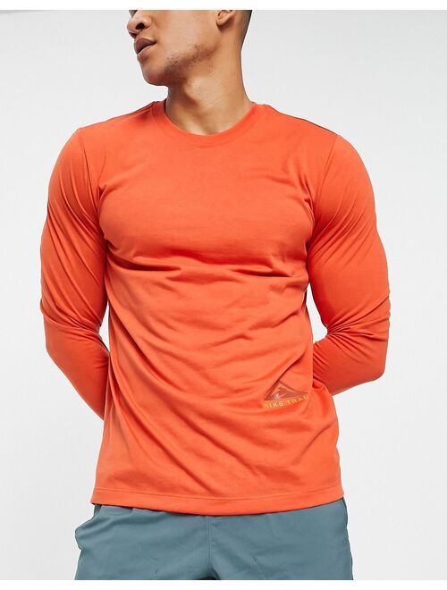 Nike Running Dri-FIT Trail long sleeve t-shirt in orange