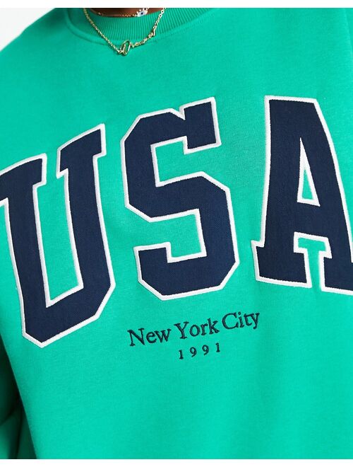 Stradivarius oversized USA sweatshirt in green